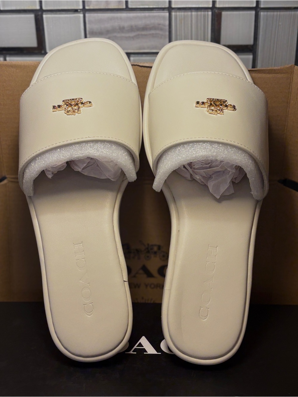 Coach Women's Cream Slide Sandals with Gold Logo